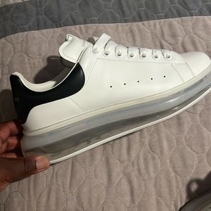 I’m selling a pair of all white Alexander McQueen tennis shoes. Only worn once